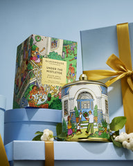 Glasshouse Under The Mistletoe Christmas candle styled as a festive gift