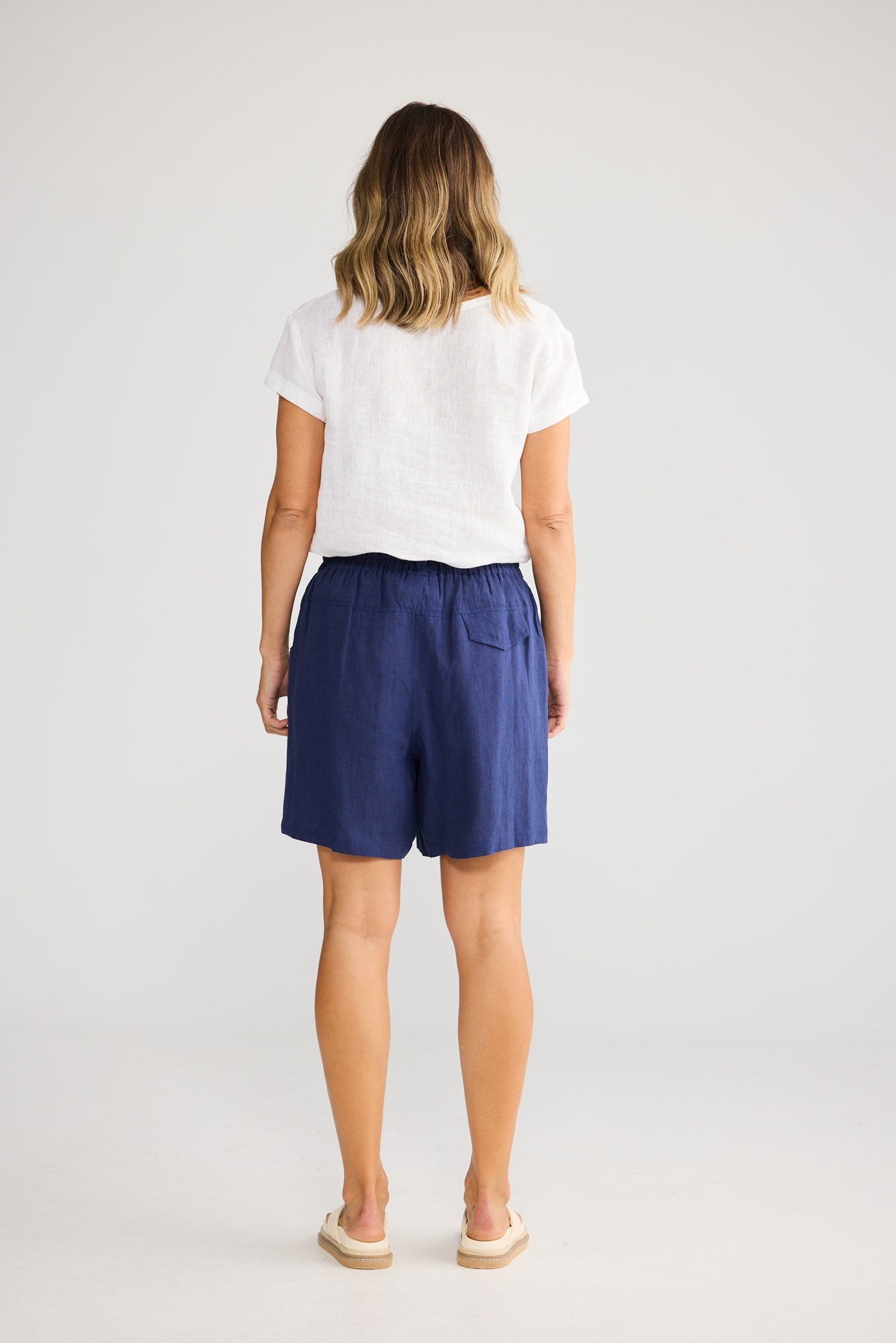 Holiday Captain Short in Navy, cut-away pockets