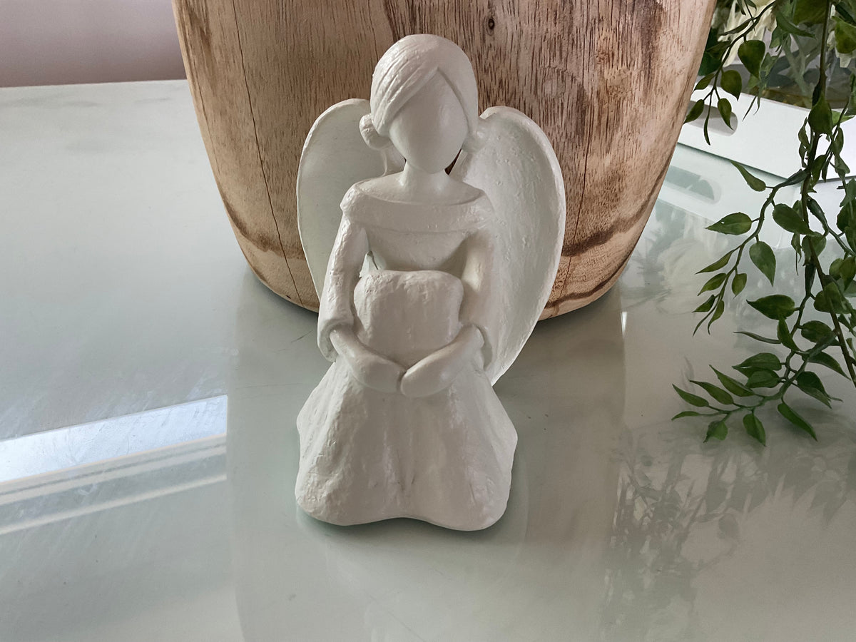 Angelic White Angel Sitting