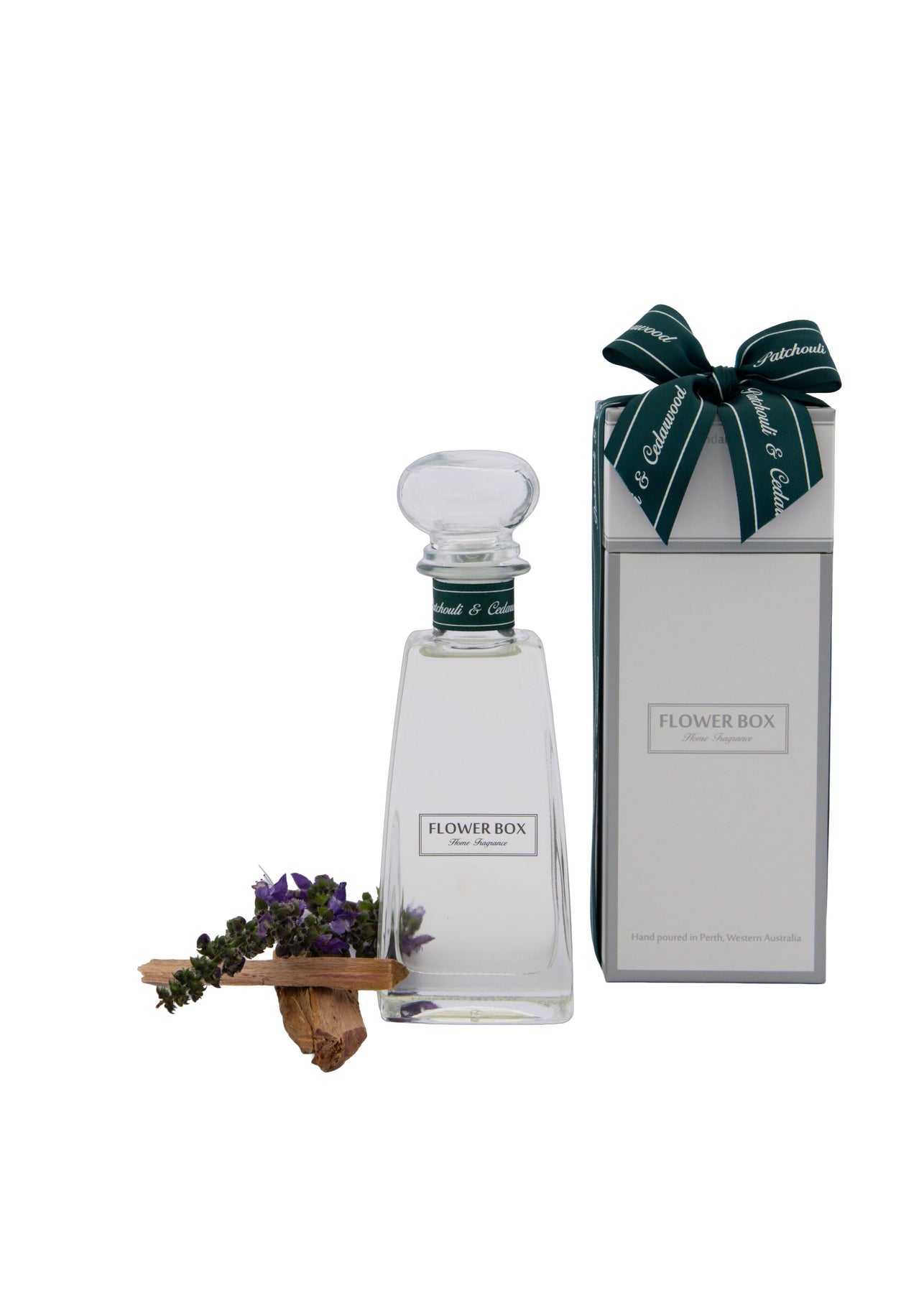 Flower Box Patchouli & Cedarwood Standard Diffuser in glass vessel with reeds