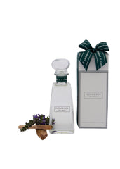 Flower Box Patchouli & Cedarwood Standard Diffuser in glass vessel with reeds