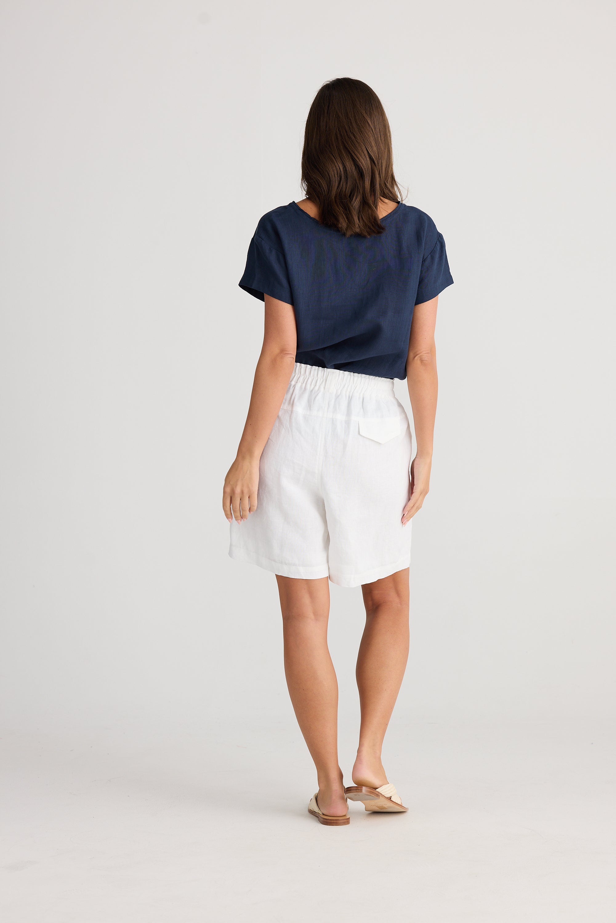 Women's white linen Captain Short with cutaway pockets