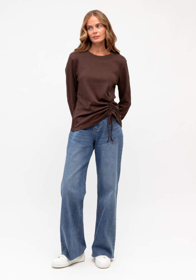 Label of Love Lara Long Sleeve Top in Chocolate Brown - full length model view